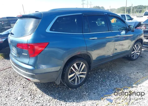 2018 Honda Pilot Touring z USA, uszkodzony, nr VIN 5FNYF5H92JB015751